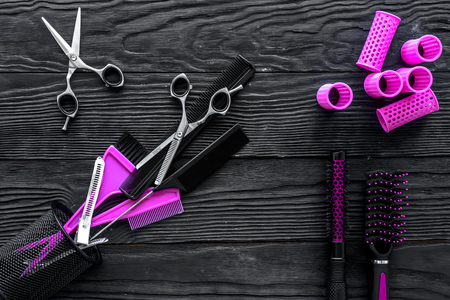 Hairdresser set on grey wooden background top view copyspaceの写真素材
