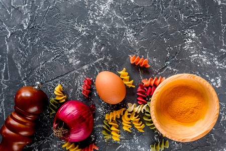 Italian food concept pasta ingredients on grey stone desk background top view copyspace close upの写真素材