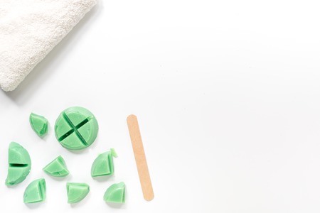 Wax and stick for depilation on white background top view copyspaceの写真素材