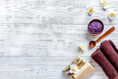 Lavender bath salt on wooden background top view.の写真素材
