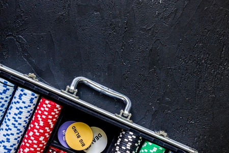 Poker set in a metallic case on a grey table top view copyspaceの写真素材