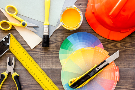 Reparing home concept. Tools on wooden desk background top viewの写真素材