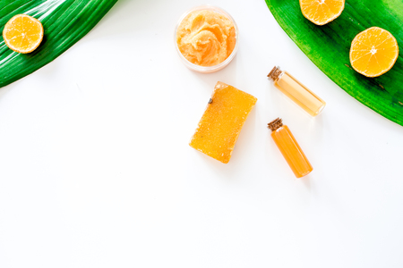 Aroma spa set. Citrus scrub, soap and lotion on white background top view copyspaceの写真素材
