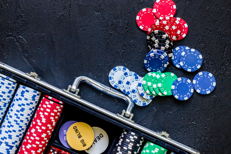 Poker set in a metallic case on a grey table top view copyspaceの写真素材