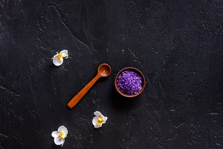Lavender bath salt on balck stone table background top view.の写真素材