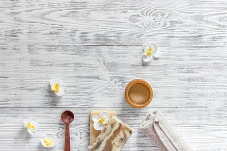 Relax concept. Handmade organic soap and gel on wooden table background top view.の写真素材
