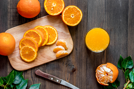 Citrus concept. Fresh fruits on wooden table background top view.の写真素材