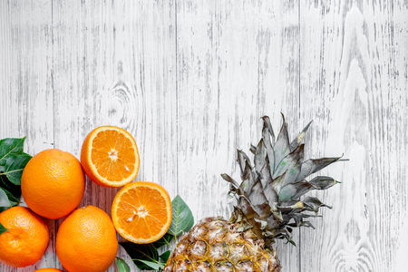 Fruits. Oranges on wooden background top view copyspace.の写真素材