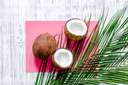 Appetizing coconut on a pink table clothの写真素材