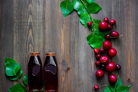 Fruits and berries for summer fruit drink on wooden table background top viewの写真素材