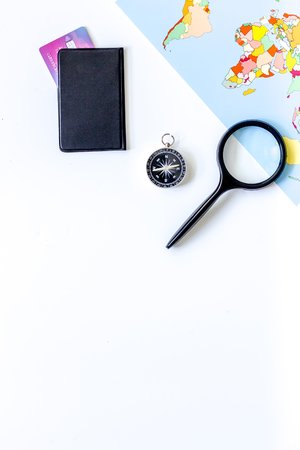 Planning trip. World map, compass and bank card on white background top view copyspaceの写真素材