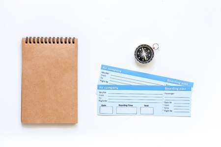 Preparing for trip. Tickets, compass on white background top view mockupの写真素材