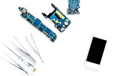 Daignostic of gadgets. White background top view.の写真素材