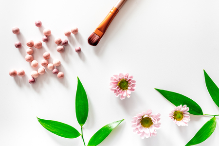 Make up brush and blush on white table background top viewの写真素材
