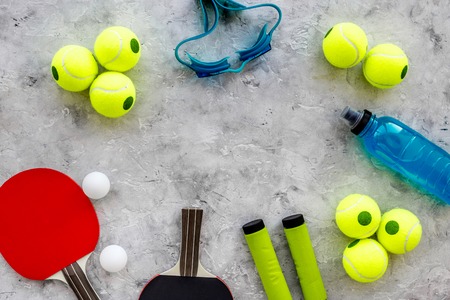 Sport background. Table tennis racket on grey background top view.の写真素材