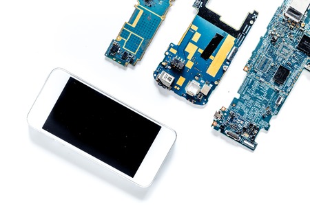 Repairing gadgets. Parts and tools on white background top view.の写真素材