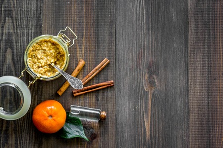 Homemade organic scrub on dark wooden tableの写真素材