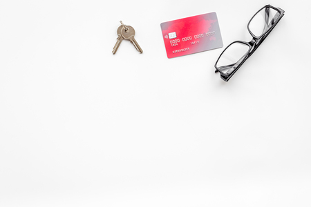 selling property online set with credit card on office desk white background top view mockupの写真素材