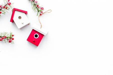 Christmas eve set with spruce branches and house toys on white background top veiw mock-upの写真素材