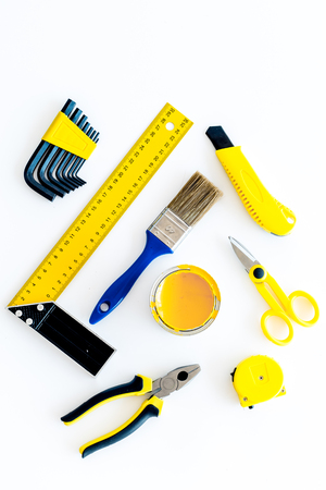 building, painting and repair tools for house constructor work place set white background top view patternの写真素材