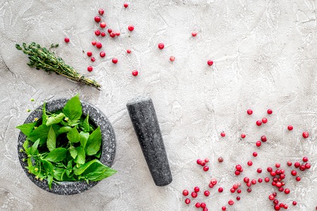 close up of ingredients for making spices and herbs in mortar stone background top view mock upの写真素材