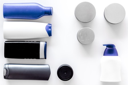 Shampoo and shower gel for men on white background top view.の写真素材