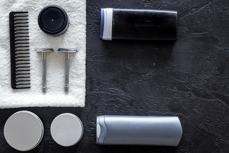 Cosmetics for men on black background top view.の写真素材