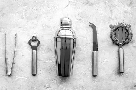 Bar tools for making cocktails on grey stone background top view.の写真素材