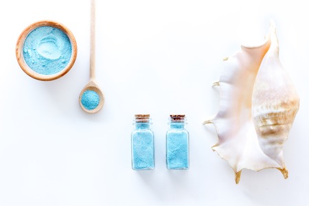 Cosmetic set with bath salt and shell from dead sea on white background top view space for textの写真素材
