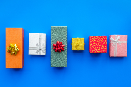 Cyber monday concept. Gift boxes pattern on blue background top view.の写真素材