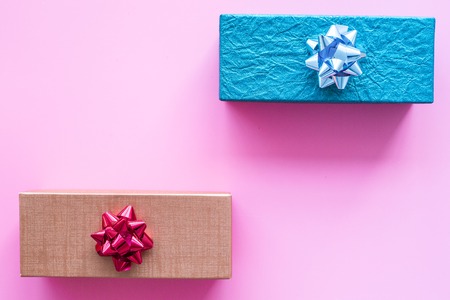 Shopping and sales. Gift boxes on pink background top view copyspaceの写真素材