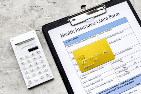 Buy health insurance. Document, bank card and calculator on grey background top view