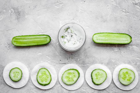 Cucumber moisturizing cream or mask pattern. Grey top view copyspaceの写真素材