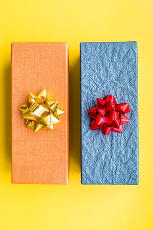 Wrapped gifts for boxing day 2018 pattern on yellow background top viewの写真素材