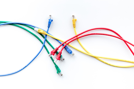 Colored patch-cord on white background top viewの写真素材