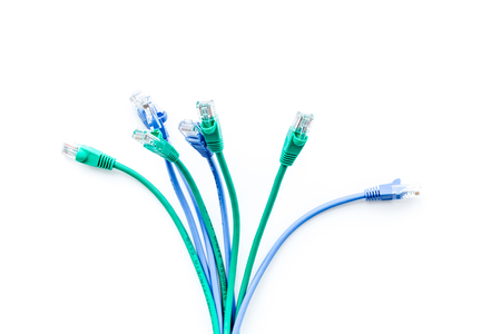 Cables for computer on white background top view.