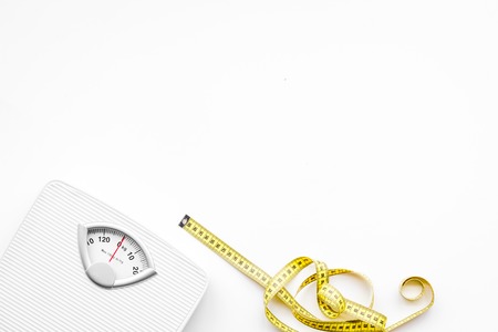 Slim concept on bright white background top viewの写真素材