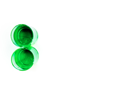 Absinthe shots on white background top view.の写真素材