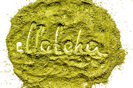Word Matcha writed at matcha powder on white background top viewの写真素材