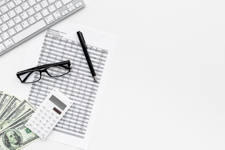 Pay bills and taxes. Papers, calculator, money on white background top view.の写真素材