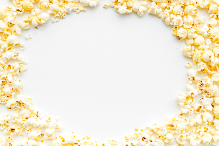 Popcorn background on white top view copy space.の写真素材
