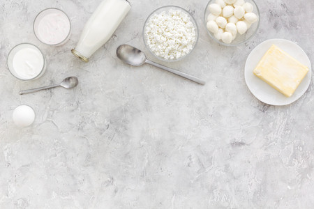 Fresh dairy products. Milk, cottage, cheese on grey table top view.の写真素材