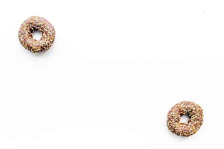 Unhealthy tasty sweets. Glazed donut on white background top view.の写真素材