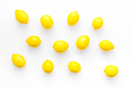 yellow lemons for cooking citrus curd white background top view space for textの写真素材