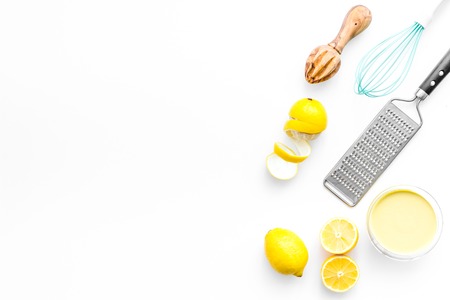 homemade lemon curd cooking on white background top view mock upの写真素材