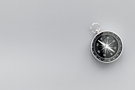 Compass on gray background top view copy spaceの写真素材