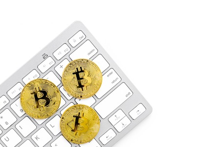 online payment with bitcoins and keyboard on white background top view mock-up