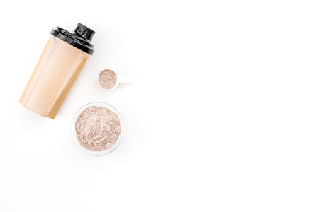 Sport diet protein nutrition and fitness equipment on white background top view mock upの写真素材