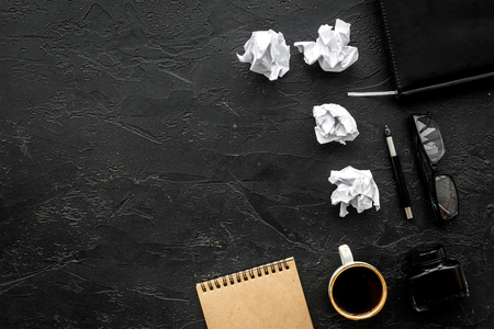 A writer workplace with tools for work on clack office table background top view mock-upの写真素材