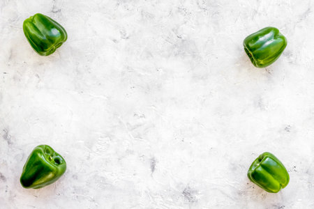 Vegetables for greeny smoothie with pepper on stone table background top view mock upの写真素材